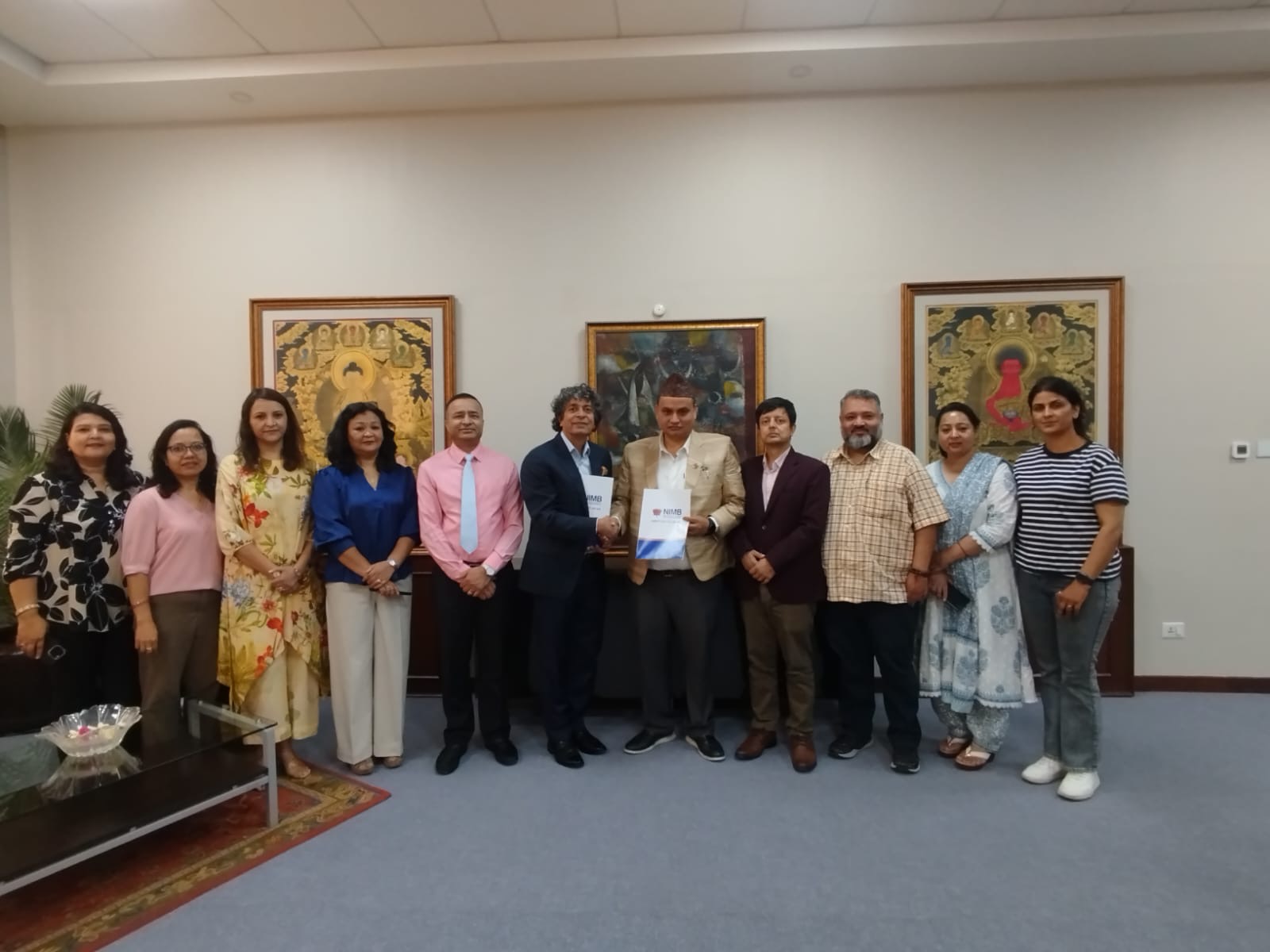 एनएमएका सदस्यलाई नेपाल इन्भेष्टमेण्ट मेगा बैंकका विभिन्न सेवाहरूमा छुट दिने